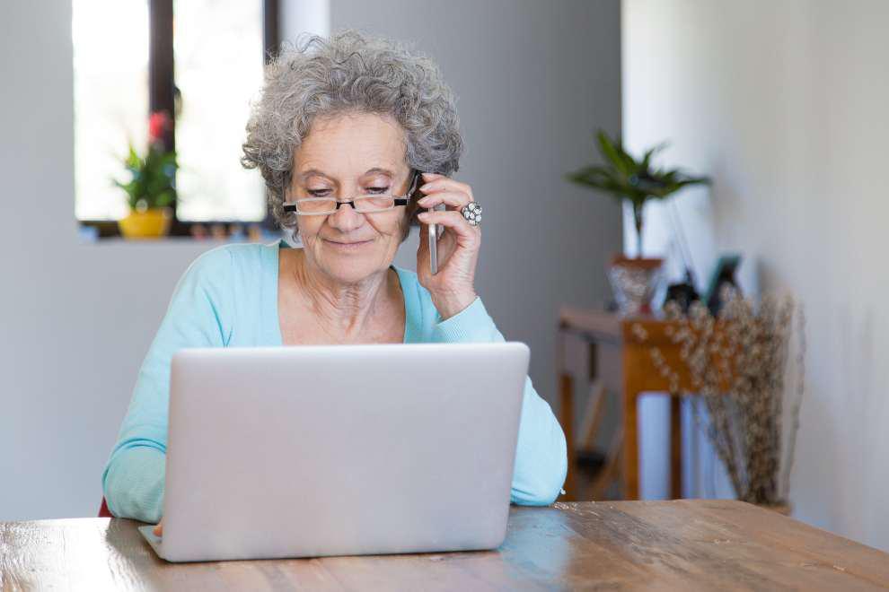 positive-retired-lady-working-home
